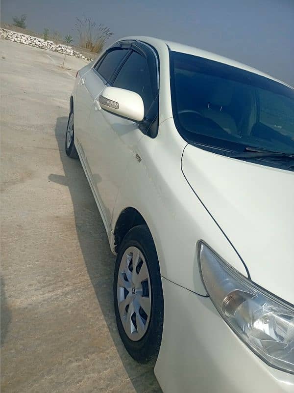 Toyota Corolla XLI 2011 better then civic  city roox mira kia  picanto 4