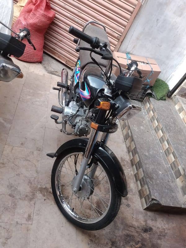 Honda CD70 2024 0