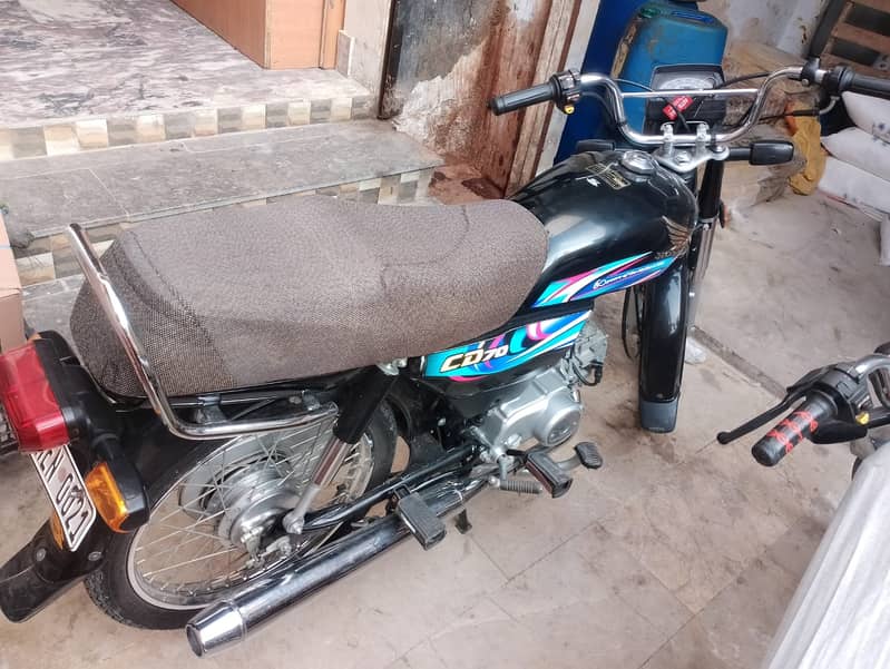 Honda CD70 2024 3