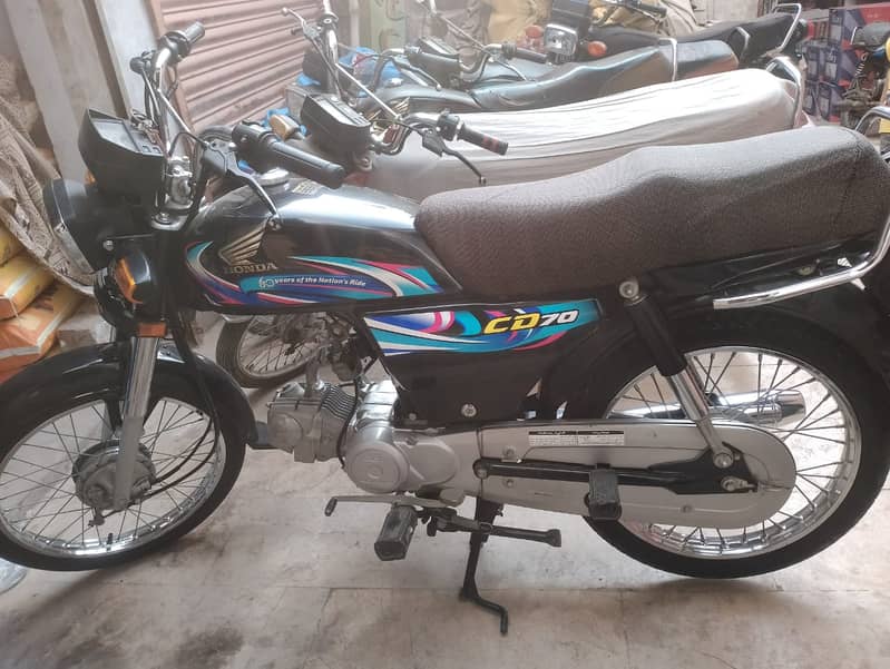 Honda CD70 2024 4