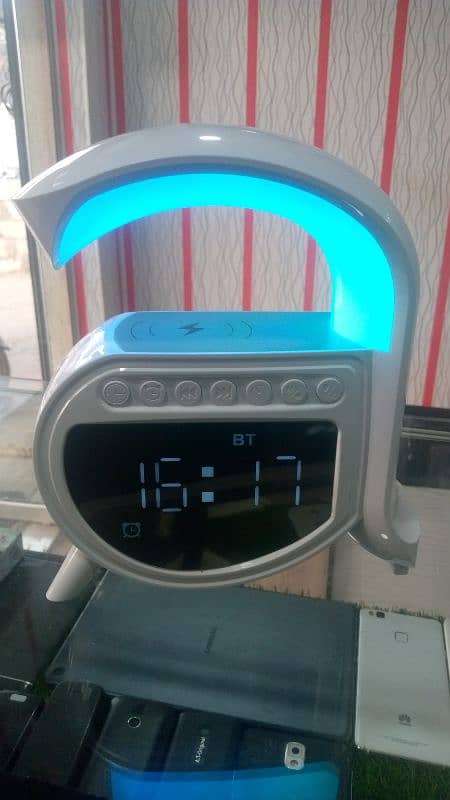 A16 with 15w wireless charger plus speaker plus clock with Alaram 1