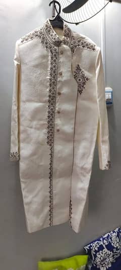 wedding sherwani with khulla and khussa negotiate