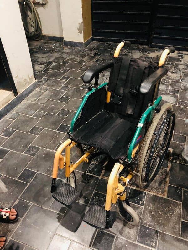 wheel chair for boy in good condition 1