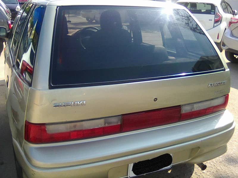 SUZUKI CULTUS VXR MODEL 2003 METALLIC GOLD COLOUR BEHTREEN CONDITION 11