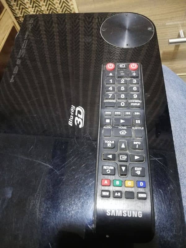 Samsung blu-rey disk player along with original remote 8