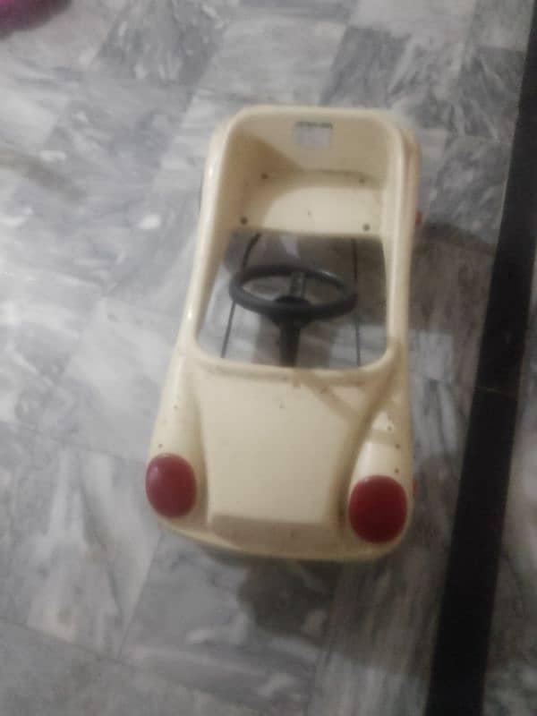 kids pedal  car in good condition 0