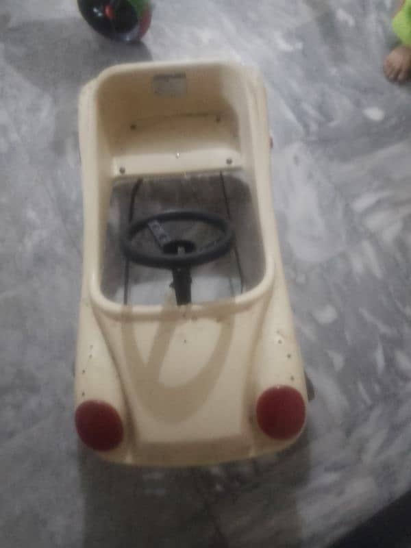 kids pedal  car in good condition 1