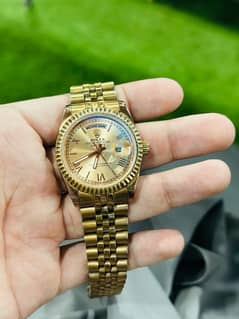 rolex watche golden colour