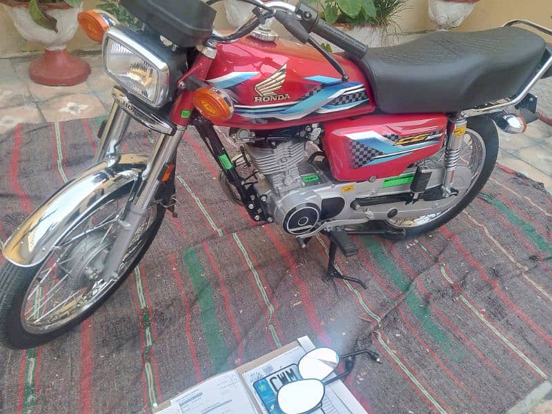 HONDA2024 1STOWNER ON MY NAME ISLAMABAD,GOLDEN NUM No scrachfresh bike 1