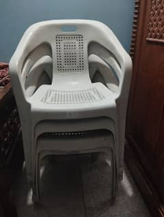 4 plastic chairs used for sale