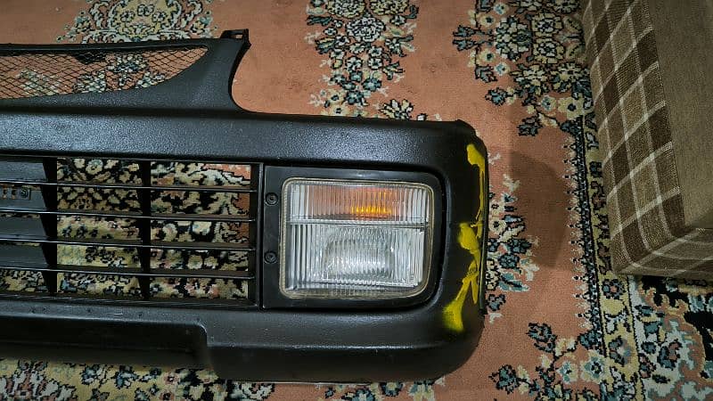 Daihatsu Mira Coure JDM front Bumper Forsale 1