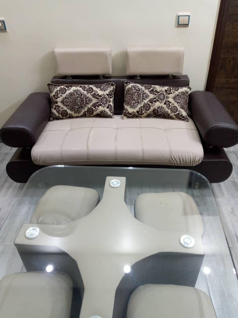 Elegant 7-Seater Sofa Set with Center Glass Table & 4 Stools 10