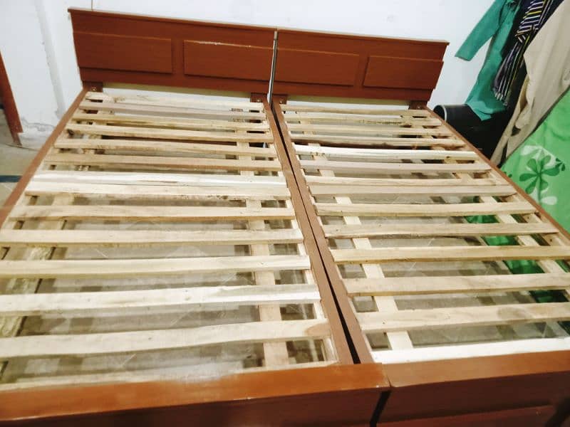 2 wooden single beds 12