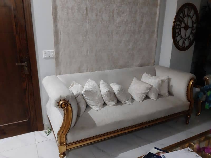 offwhite sofa with golden leafing for sale 0