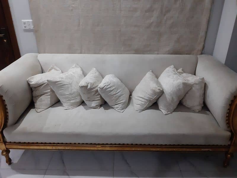 offwhite sofa with golden leafing for sale 1