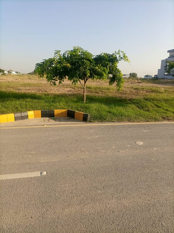 30x60 Prime Location Plot on 50ft Street . Very Near From Main Markaz 11