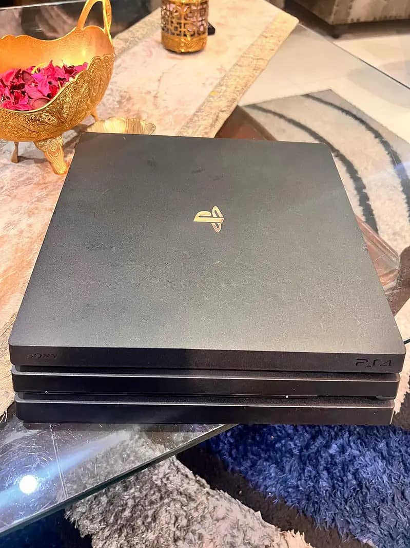 Ps4 pro 1TB With Games Purchased  Abu Dhabi. 1