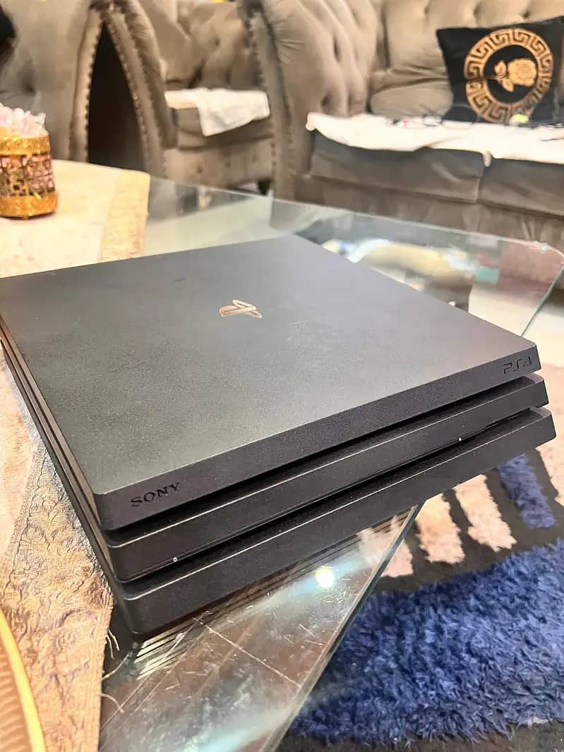 Ps4 pro 1TB With Games Purchased  Abu Dhabi. 3