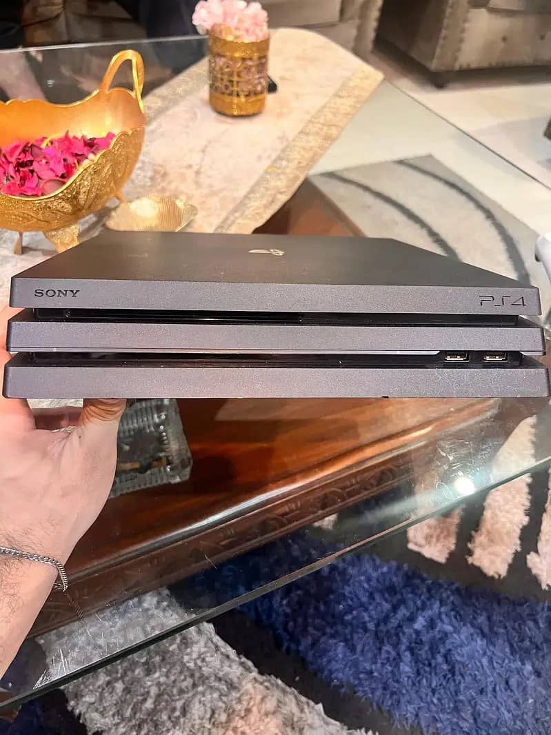 Ps4 pro 1TB With Games Purchased  Abu Dhabi. 4