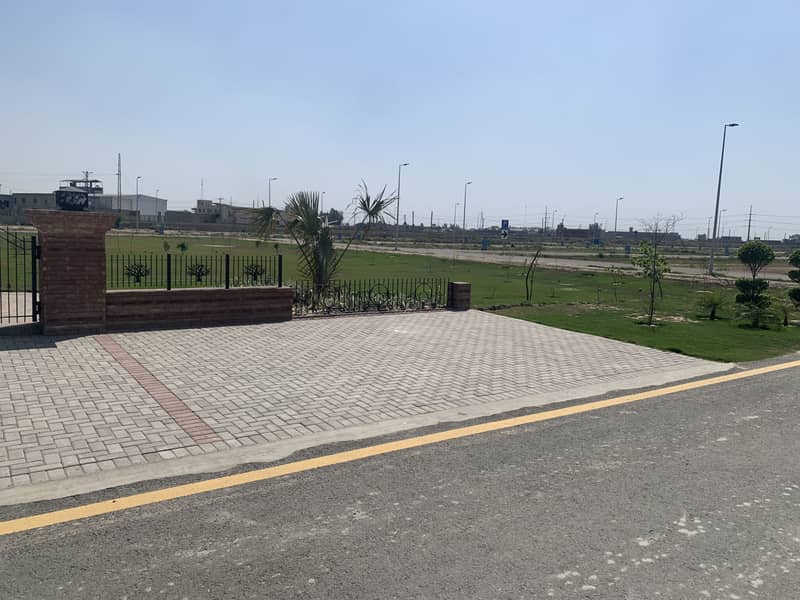 5 MARLA ALL DUES CLEAR POSSESSION RESIDENTIAL PLOT IS FOR SALE IN BLOCK "4R" DHA PHASE 11 RAHBAR IN 200 NUMBERS 15