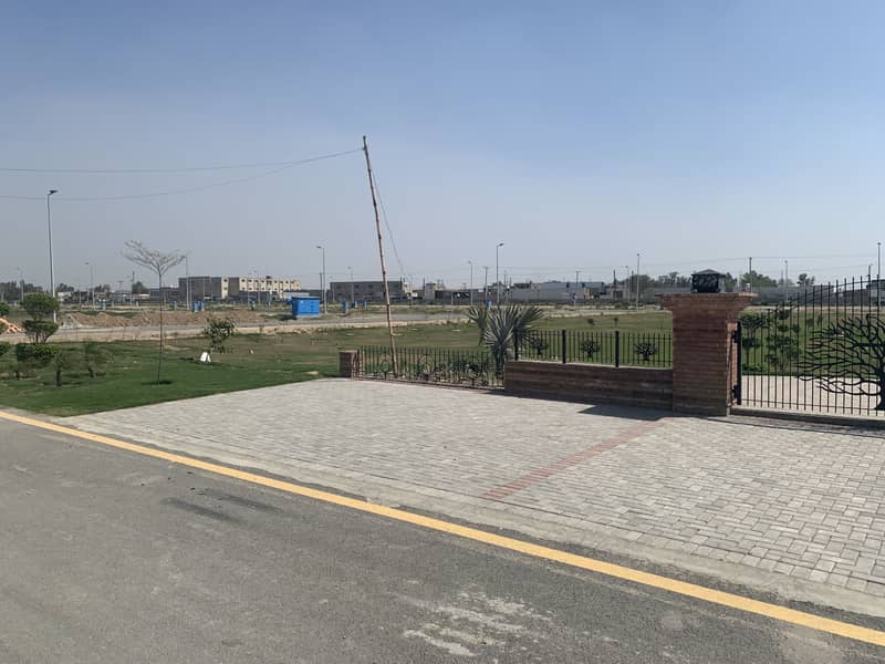 5 MARLA ALL DUES CLEAR POSSESSION RESIDENTIAL PLOT IS FOR SALE IN BLOCK "4R" DHA PHASE 11 RAHBAR IN 200 NUMBERS 18