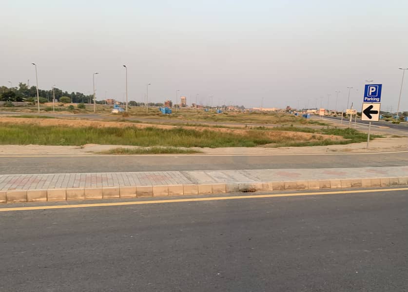 5 MARLA ALL DUES CLEAR POSSESSION RESIDENTIAL PLOT IS FOR SALE IN BLOCK "4R" DHA PHASE 11 RAHBAR IN 200 NUMBERS 24