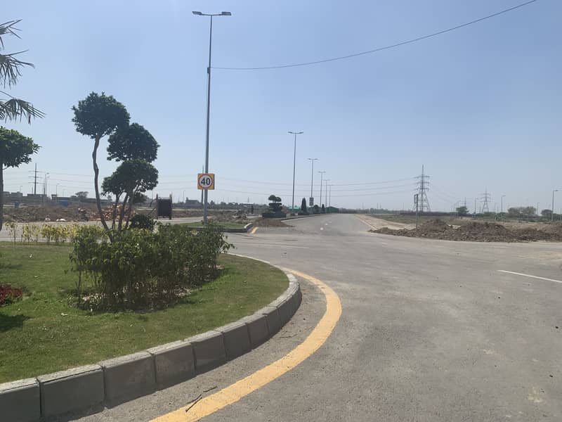 5 MARLA ALL DUES CLEAR POSSESSION RESIDENTIAL PLOT IS FOR SALE IN BLOCK "4R" DHA PHASE 11 RAHBAR IN 200 NUMBERS 26