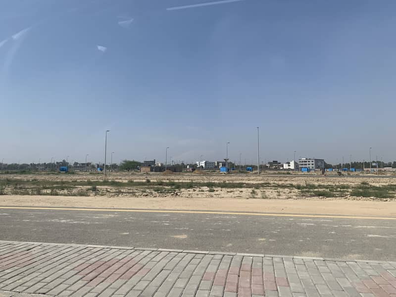 5 MARLA ALL DUES CLEAR POSSESSION RESIDENTIAL PLOT IS FOR SALE IN BLOCK "4R" DHA PHASE 11 RAHBAR IN 200 NUMBERS 32