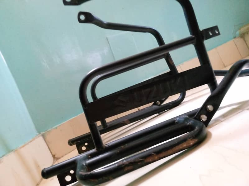 Suzuki Gd 110 s footrest and safe guard 1