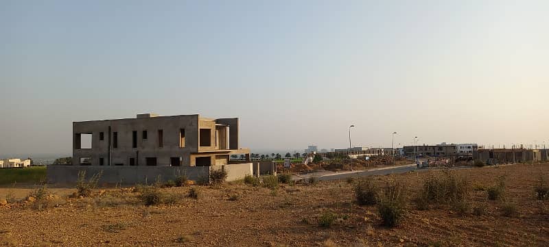 Bahria Hills Plots FOR SALE. Facing Jinnah Avenue and 2km from Main Entrance of BTK Heighted Location 15