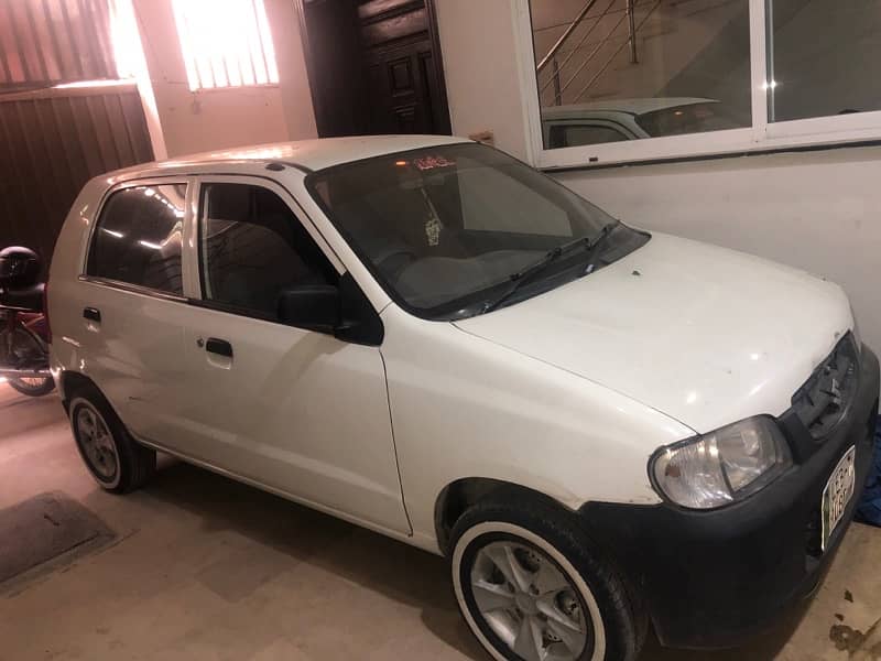 white suzuki alto 1