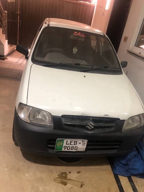 white suzuki alto 16