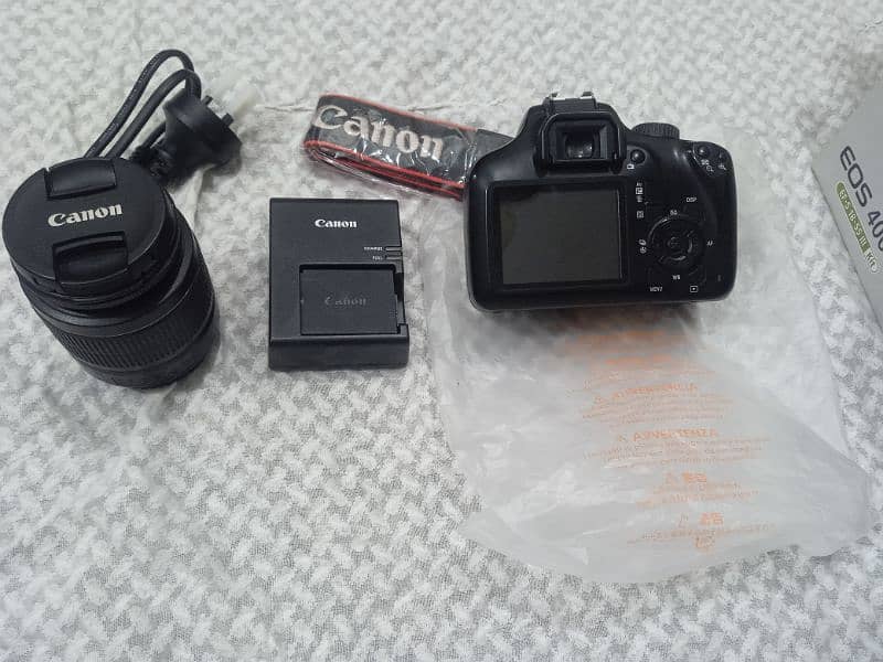 Canon EOS 4000D DSLR With EF-S 18-55mm F3.5-5.6 III Lens . . . 1