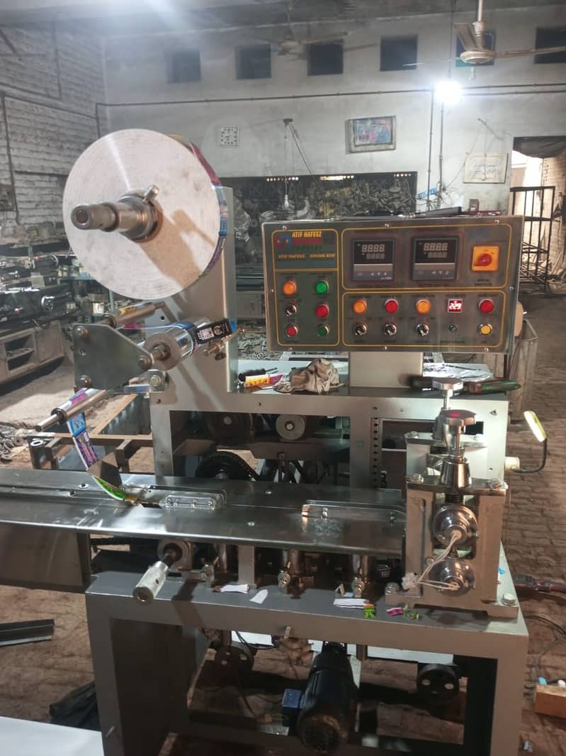 Chocolate/Surf/Bun/Shawarma/Kulfi/Pouch/Rus/Rusk/Soap Packing Machine 13