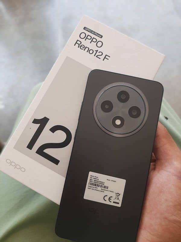 OPPO Reno 12f with warranty box charger 2