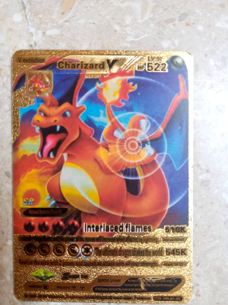 Golden Pokemon card level 92 Charizard V 0