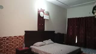 A brand new bed room set with king size bed with cupboard dressing.