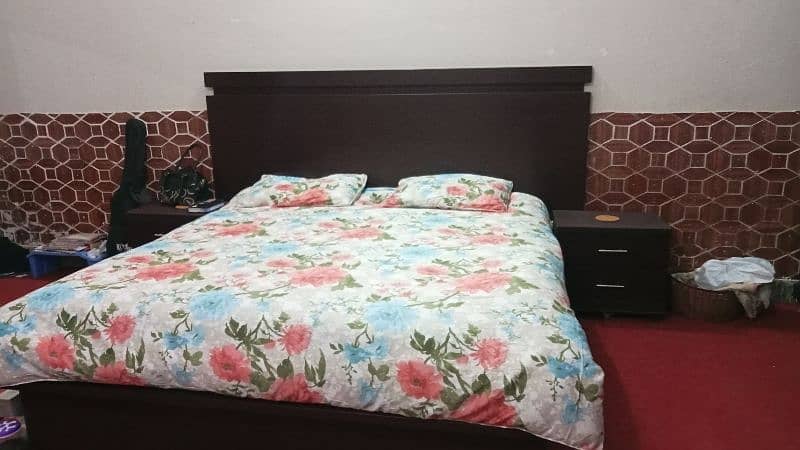 A brand new bed room set with king size bed with cupboard dressing. 3