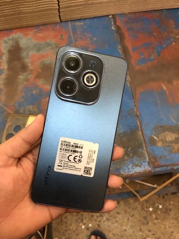 infinix hot 40i 8+8 128 with box and charge in 4 month warranty 0