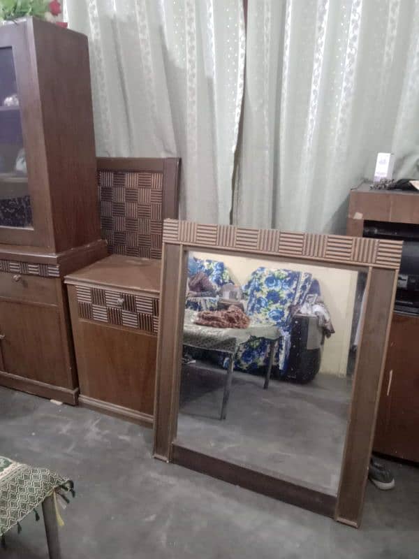 bed without matress or showcase or side tables (2) and dressing table 3