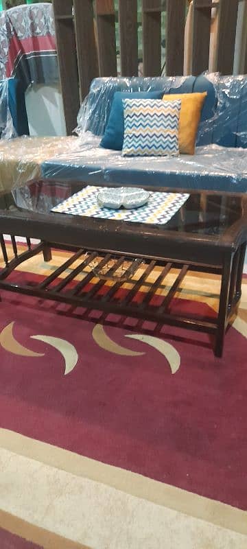 sofa cumbed and center glass table 9