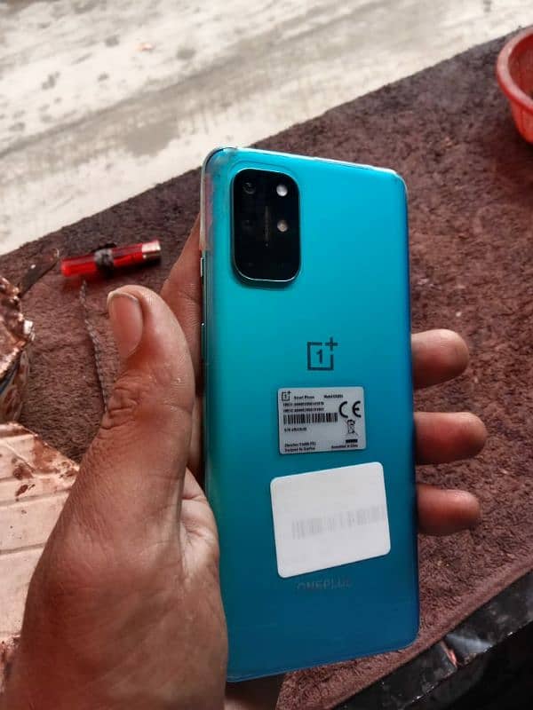 OnePlus 8t with box minor 3 lines 1