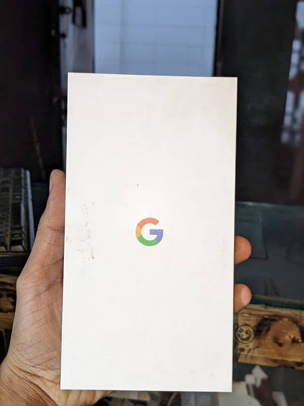 Google pixel 4 xl  with box charger and handfree 10