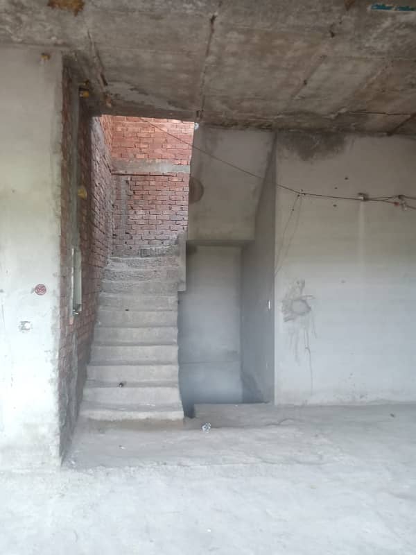 Kanal Corner Incomplete Grey Structure with Basement 4