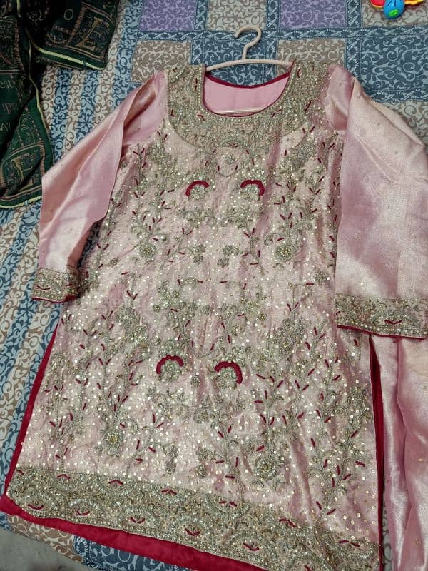 elegant pink color dress dabka work . 0