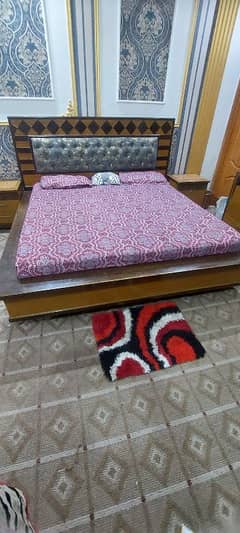 King floor bed with side tables