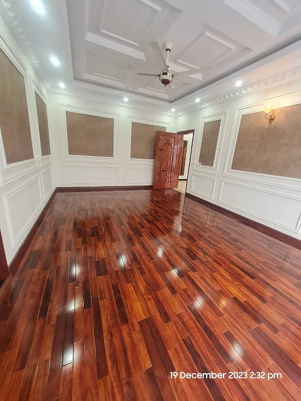 1 Kanal Brand New Super Hot Located Bungalow On Main Road With Full Basement And Home Theatre Is Available For Rent In The Best Block Of DHA Phase 6 Lahore Opposite To Lahore Garrison University 34