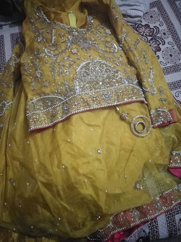 mustard mehandi langaha with short shirt and langaha with out dupatta. 0