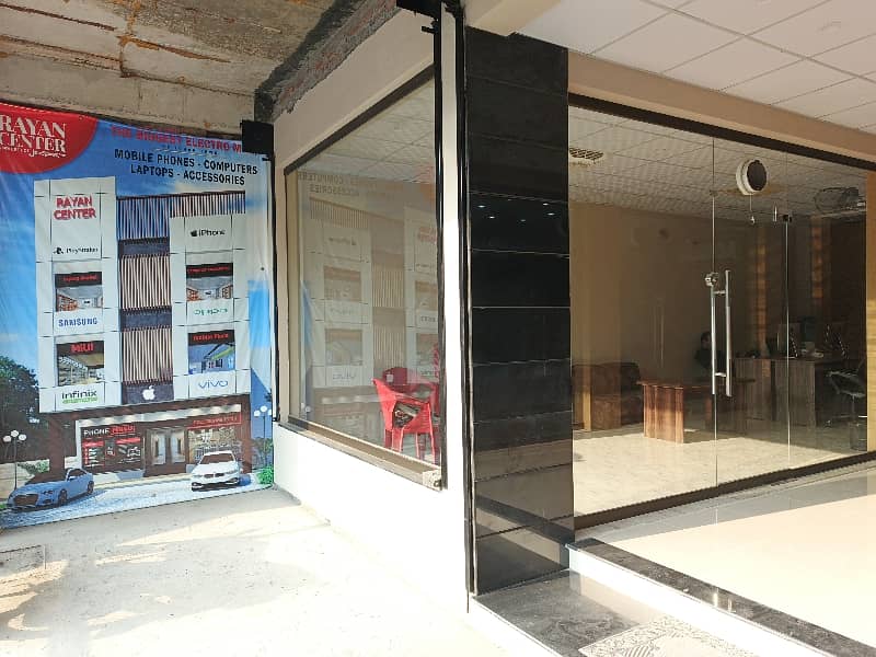 BRAND NEW SHOP FOR SALE IN JOHAR TOWN NEAR EXPO CENTER 9