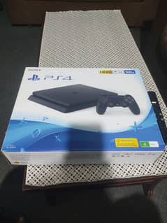 PS4 500 GB as good as new with two controllers and 4 cds for sale